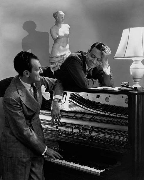 Cole Porter "You're the Top" composer and singer with a friend and a piano.